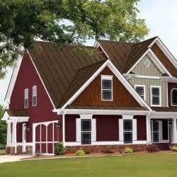 white house with brown metal roof|reddish brown roof house colors.